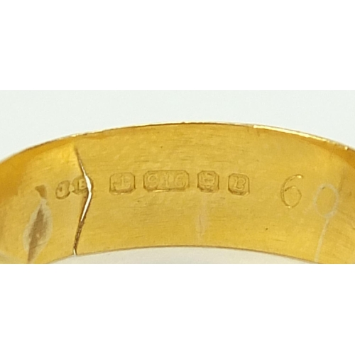 665 - Two Elizabeth II 22ct gold wedding bands with engraved decoration, London 1976 size P and Birmingham... 