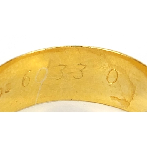 665 - Two Elizabeth II 22ct gold wedding bands with engraved decoration, London 1976 size P and Birmingham... 