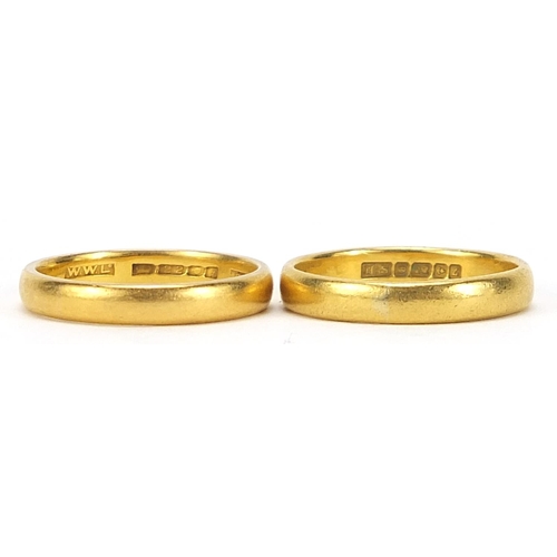 705 - Two 22ct gold wedding bands, London 1906 size M and Birmingham 1960 size N, total 7.3g - this lot is... 
