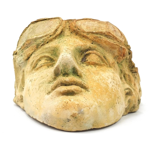 2590 - Military interest garden stoneware wall mask of a pilot, 26cm high