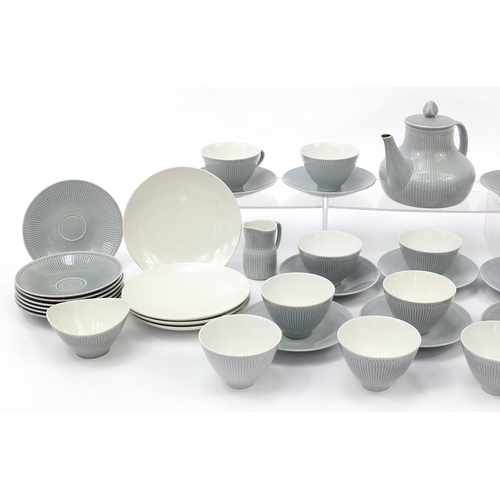 708 - Rorstrand, 1970's Swedish teaware including cups and plates, the largest 19cm in diameter