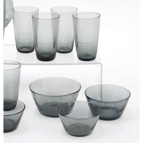 714 - Whitefriars and other smoky glassware including a lemonade jug with eleven glasses, the largest 21.5... 