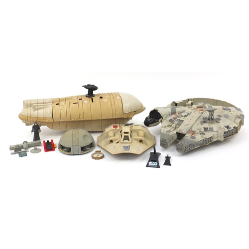 2025 - Vintage Star Wars toys including a Millennium Falcon and a Rebel Transport