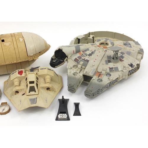 2025 - Vintage Star Wars toys including a Millennium Falcon and a Rebel Transport