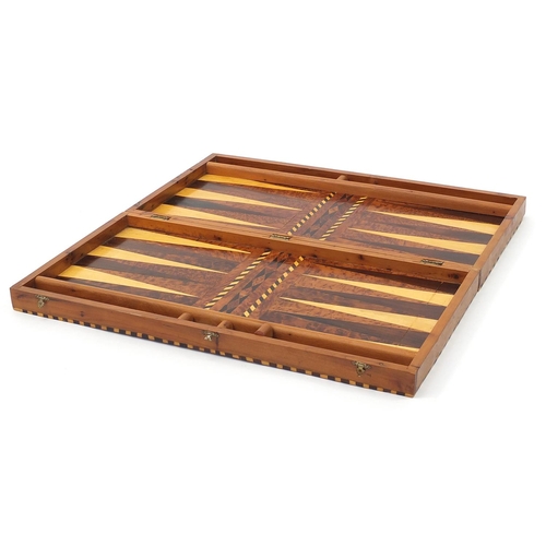 932 - Inlaid exotic wood folding backgammon games board, 61cm x 60cm when open