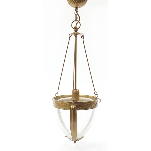 1953 - Hollywood Regency style gilt metal light pendant with glass shade, approximately 80cm high