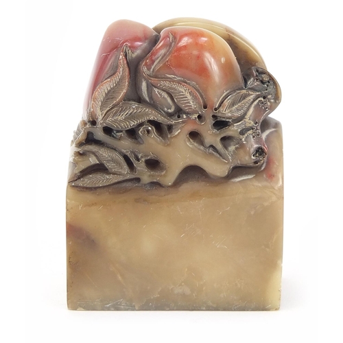 1961 - Chinese soapstone seal carved with fruit on a vine, character marks to the base, 7cm high