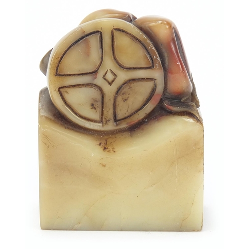 1961 - Chinese soapstone seal carved with fruit on a vine, character marks to the base, 7cm high