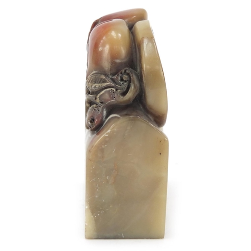 1961 - Chinese soapstone seal carved with fruit on a vine, character marks to the base, 7cm high