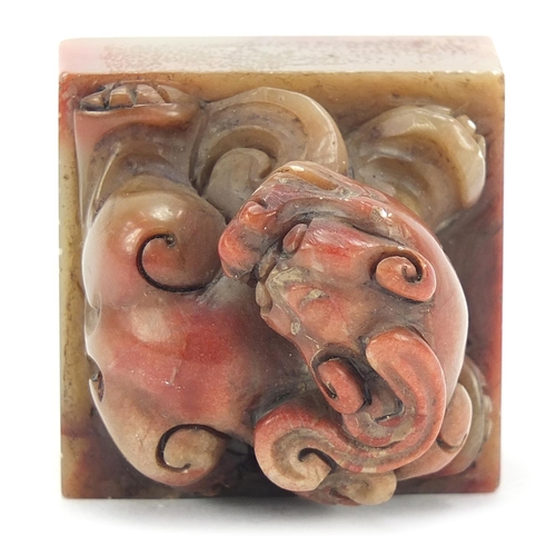 453 - Chinese soapstone seal carved with a dragon, character marks to the base, 5cm high