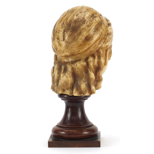 105 - Wax bust of a female raised on turned mahogany pedestal base, 41.5cm high