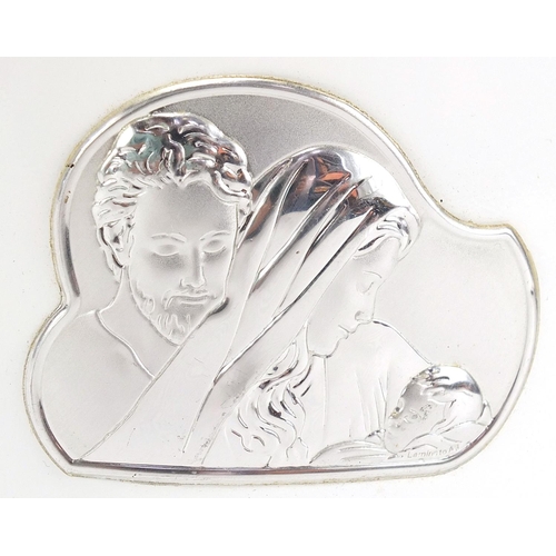 2546 - Italian curved glass plaque with a silver mount embossed with Madonna and child, 16.5cm wide