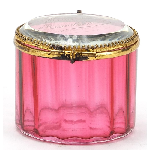 134 - 19th century cranberry glass casket with gilt metal mounts, etched Maggie Rawlinson, 7cm in diameter