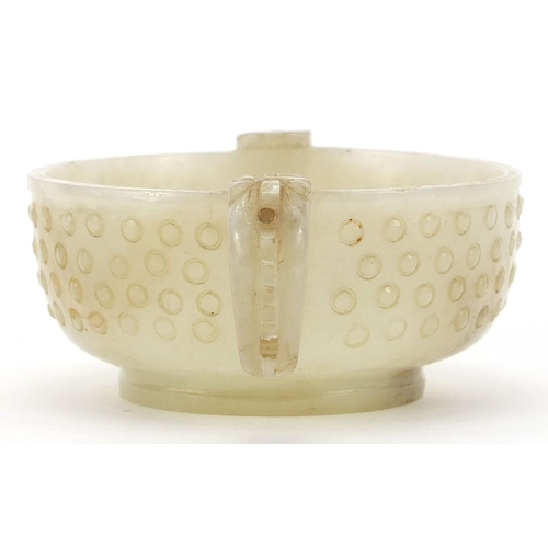 24 - Chinese white jade libation cup with dragon handles, 12cm high