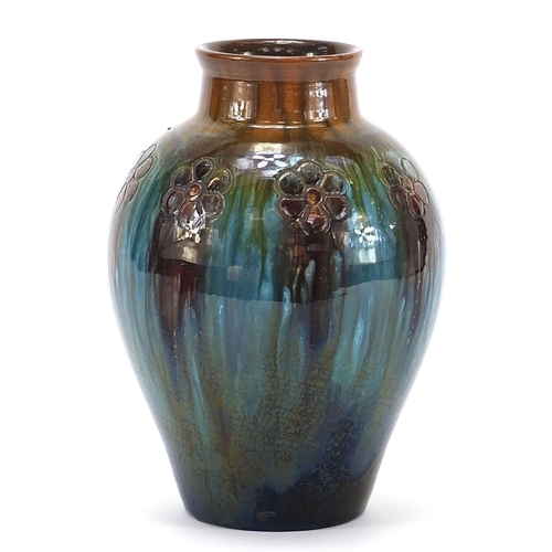 1 - Christopher Dresser for Linthorpe Pottery, Arts & Crafts vase having a mottled glaze incised with fl... 