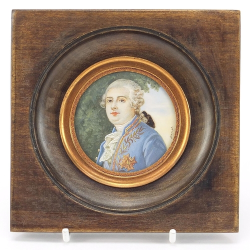 26 - French circular hand painted portrait miniature of Louis XVI, mounted and framed, the miniature appr... 
