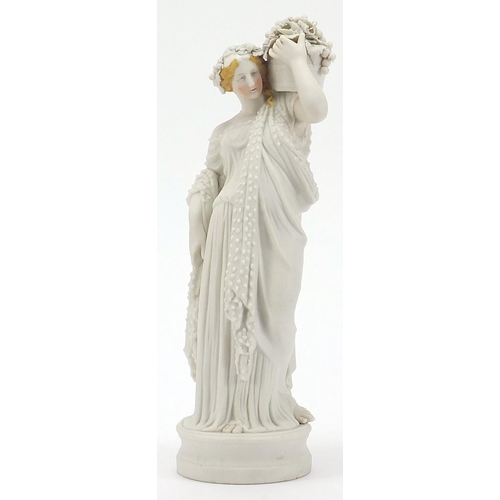 2050 - 19th century parian figurine of a maiden holding a basket, 34cm high