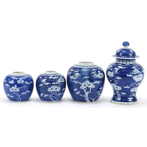 19 - Chinese blue and white porcelain hand painted with prunus flowers, comprising a baluster vase with c... 