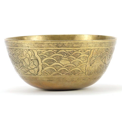 2032 - Chinese patinated bronze dragon bowl, 24.5cm in diameter