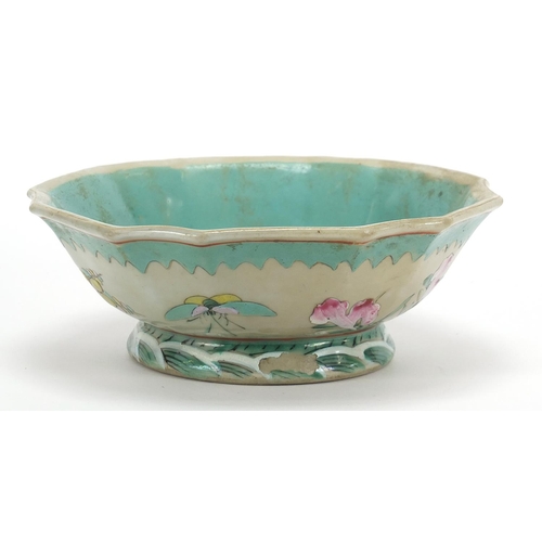 645 - Chinese porcelain footed bowl hand painted in the famille rose palette with a butterfly amongst flow... 