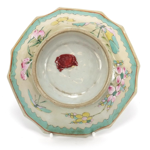 645 - Chinese porcelain footed bowl hand painted in the famille rose palette with a butterfly amongst flow... 