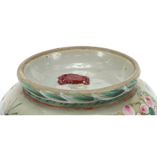 645 - Chinese porcelain footed bowl hand painted in the famille rose palette with a butterfly amongst flow... 