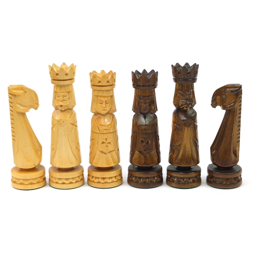 2061 - Large carved wood chess set with folding board, the largest pieces each 14cm high, the board 60cm x ... 