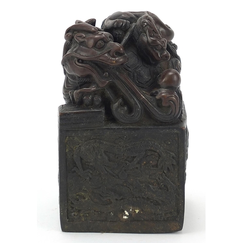 383 - Large Chinese patinated bronze dragon and tortoise design seal, character marks to the base, 13.5cm ... 