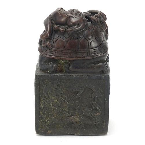 383 - Large Chinese patinated bronze dragon and tortoise design seal, character marks to the base, 13.5cm ... 