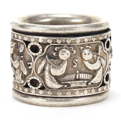 1958 - Chinese silver coloured metal archer's ring with rotating band, size Z