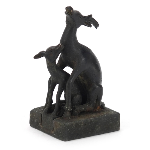 2036 - Chinese patinated bronze two piece seal in the form of a deer and foal, character marks to the base,... 