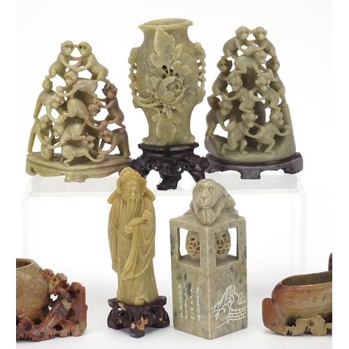 551 - Chinese soapstone carvings including a vase on stand and an Emperor, the largest 15.5cm wide