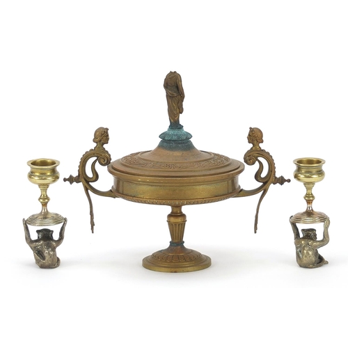 2085 - Novelty pair of silver plated and brass monkey design candlesticks and a classical tazza and cover w... 