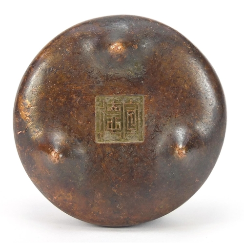 2043 - Chinese patinated bronze tripod censer with twin handles, character marks to the base, 5.5cm in diam... 