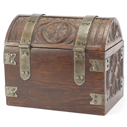 617 - 18th century style carved oak dome topped casket with metal mounts and heraldic crest, 26cm H x 30cm... 