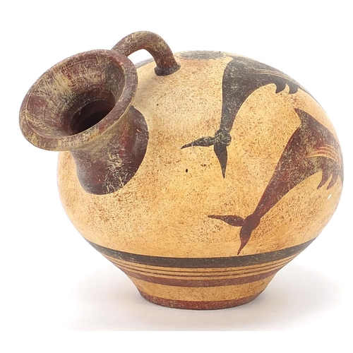 2086 - Peruvian terracotta vessel hand painted with fish, stamped to the base, 11cm high