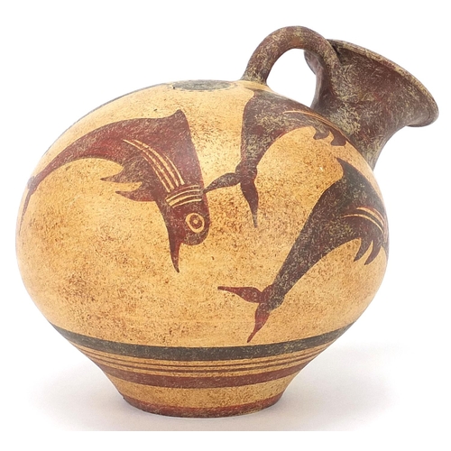 2086 - Peruvian terracotta vessel hand painted with fish, stamped to the base, 11cm high