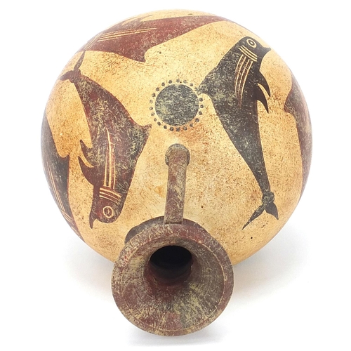 2086 - Peruvian terracotta vessel hand painted with fish, stamped to the base, 11cm high