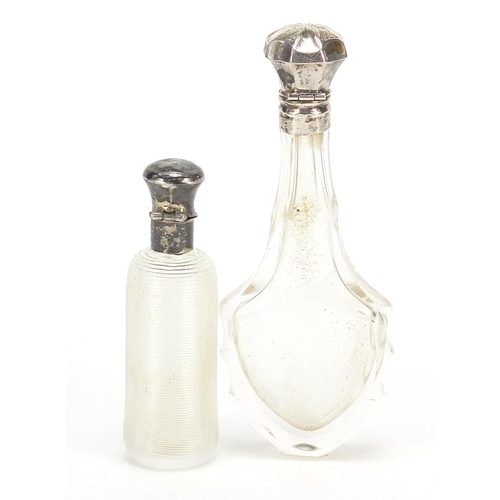 136 - Two Dutch silver mounted cut glass scent bottles including one with ribbed body, 12cm and 8.5cm high