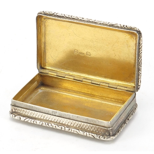 42 - Joseph Willmore, George IV silver snuff box with hinged lid, engine turned decoration and gilt inter... 