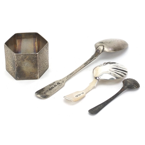 483 - Silver items including a Georgian caddy spoon with shell shaped bowl and a heavy hexagonal napkin ri... 