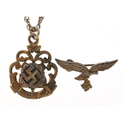 1924 - German military interest silver pendant on chain and eagle brooch, the pendant 3cm high, total 14.7g