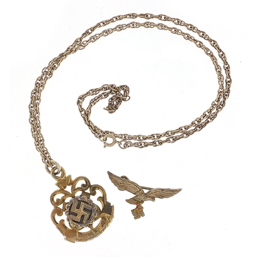 1924 - German military interest silver pendant on chain and eagle brooch, the pendant 3cm high, total 14.7g