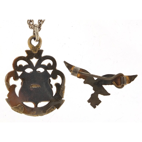 1924 - German military interest silver pendant on chain and eagle brooch, the pendant 3cm high, total 14.7g