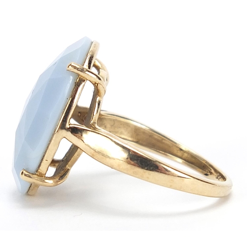 359 - 9ct gold facetted light blue stone ring, size N, 4.0g