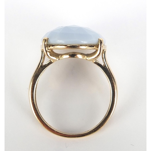 359 - 9ct gold facetted light blue stone ring, size N, 4.0g