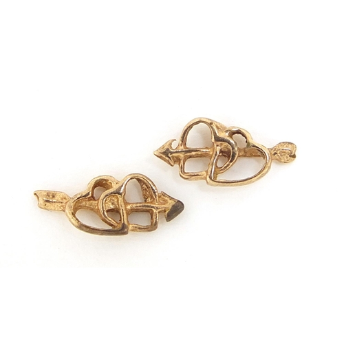 2545 - Pair of 9ct gold double love heart and arrow stud earrings, 1cm wide, 1.2g