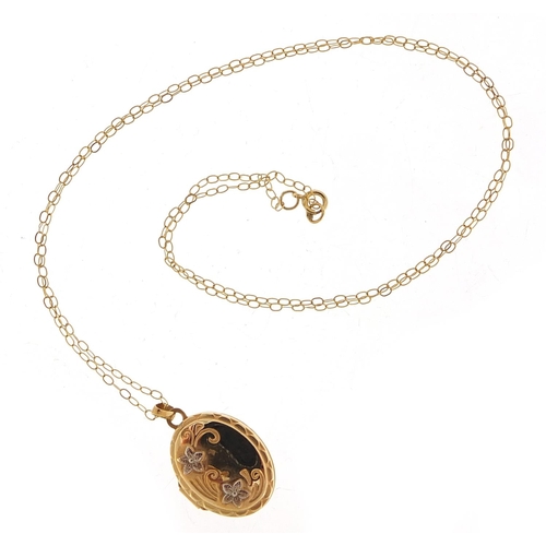 951 - 9ct gold locket on a 9ct gold necklace, 2cm high and 42cm in length, total 1.7g