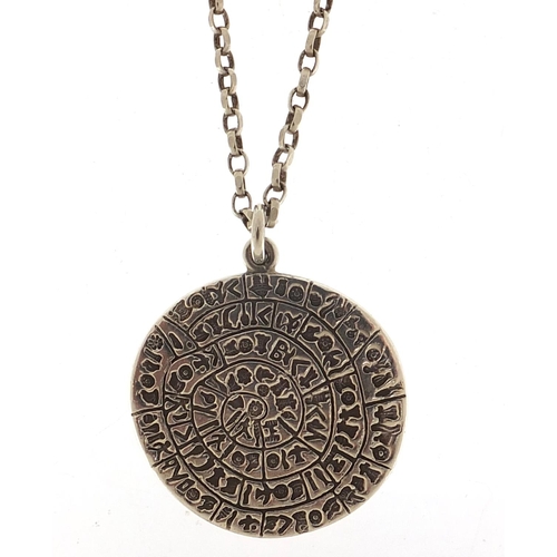 2029 - Silver Egyptian revival hieroglyphics medallion on a silver necklace, 4cm and 70cm in length, total ... 