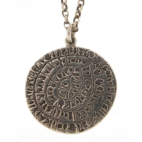 2029 - Silver Egyptian revival hieroglyphics medallion on a silver necklace, 4cm and 70cm in length, total ... 